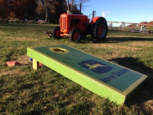 Corn Hole and tractor at Butler's Orchard