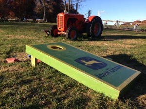 Corn Hole and tractor at Butler's Orchard