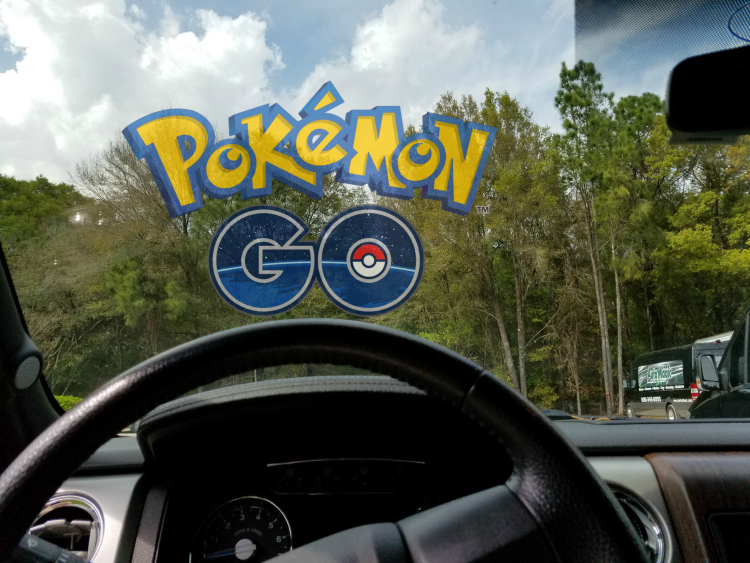 Pokemon Go image through windshield of car