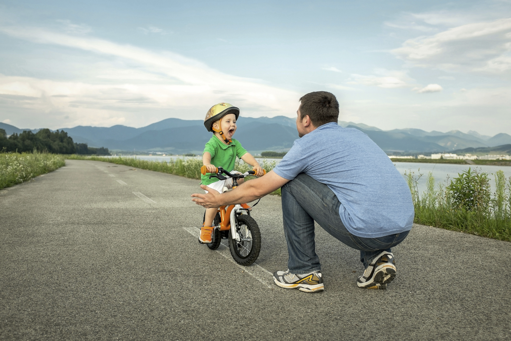 Father and son on the bicycle outdoor